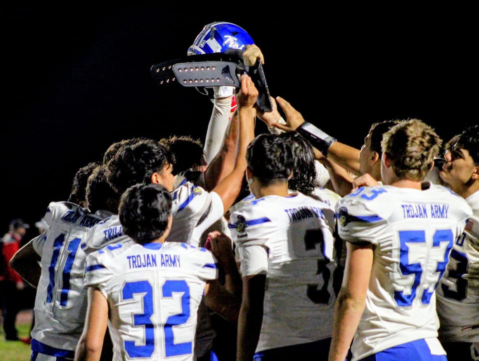 Trojan sports roundup: Varsity football takes belt in Westside Rumble, JV streak hits 36 with comeback win
