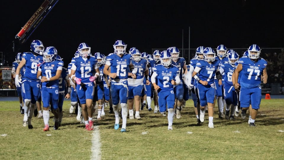 Trojan football team overpowers West Valley 42-14 in playoff opener